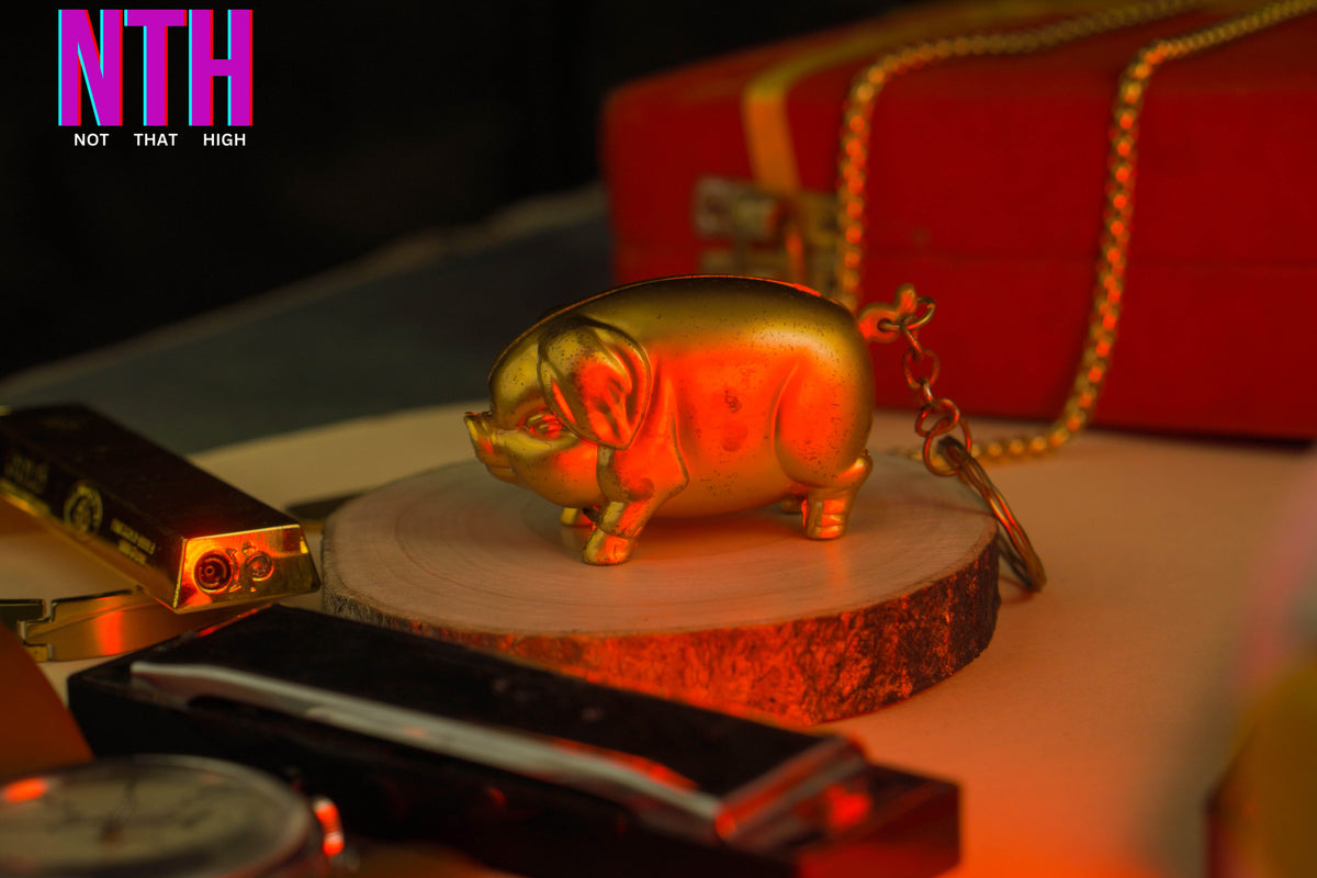 NTH Golden Pig Lighter – A Symbol of Luck, Luxury & Style