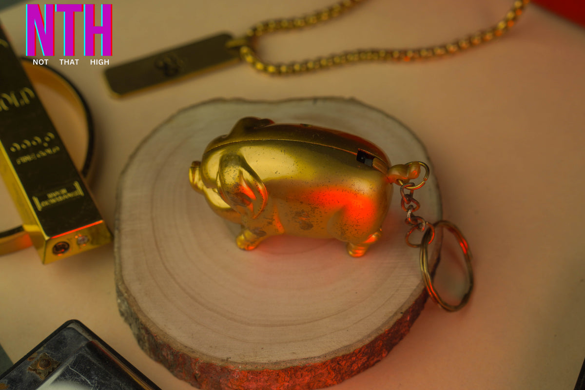 NTH Golden Pig Lighter – A Symbol of Luck, Luxury & Style