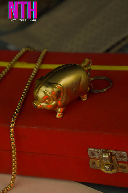 NTH Golden Pig Lighter – A Symbol of Luck, Luxury & Style