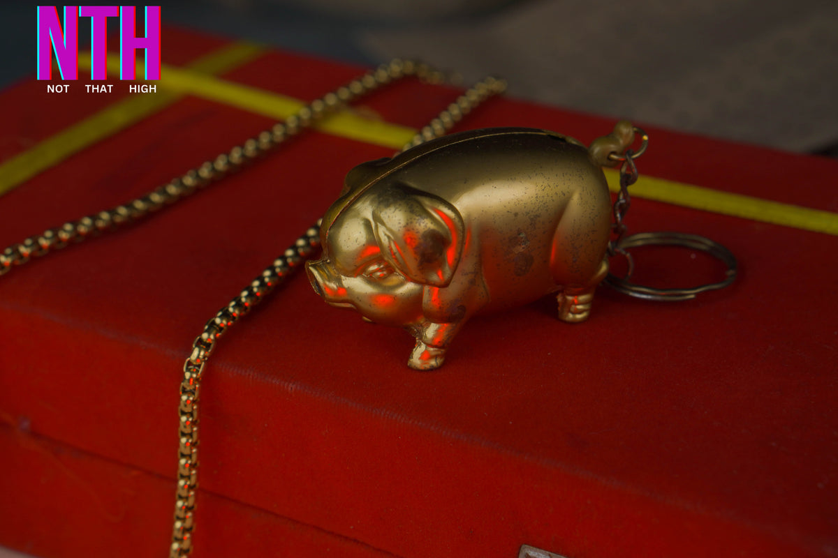 NTH Golden Pig Lighter – A Symbol of Luck, Luxury & Style